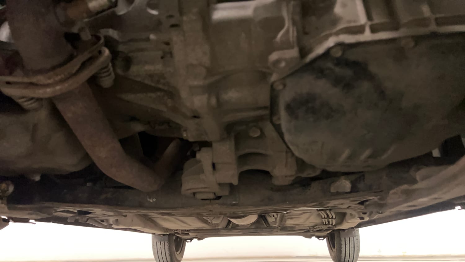 Used 2018 Maruti Suzuki Baleno Delta 1.2 AT Petrol Automatic extra FRONT LEFT UNDERBODY VIEW