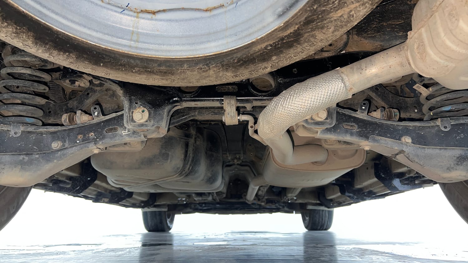 Used 2024 Mahindra XUV700 AX 5 Petrol AT 5 STR Petrol Automatic extra REAR UNDERBODY VIEW (TAKEN FROM REAR)