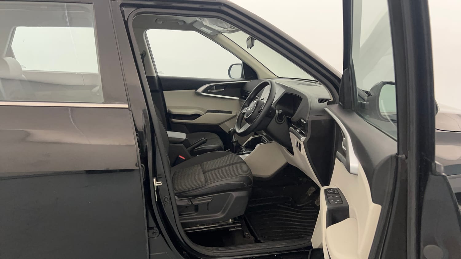 Used 2022 Kia Carens Prestige Plus 1.4 Petrol MT 7 STR Petrol Manual interior RIGHT SIDE FRONT DOOR CABIN VIEW