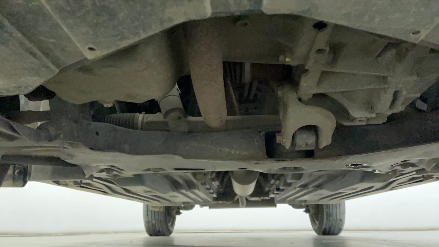 Used 2022 maruti-suzuki Vitara Brezza VXi Petrol Manual extra FRONT LEFT UNDERBODY VIEW