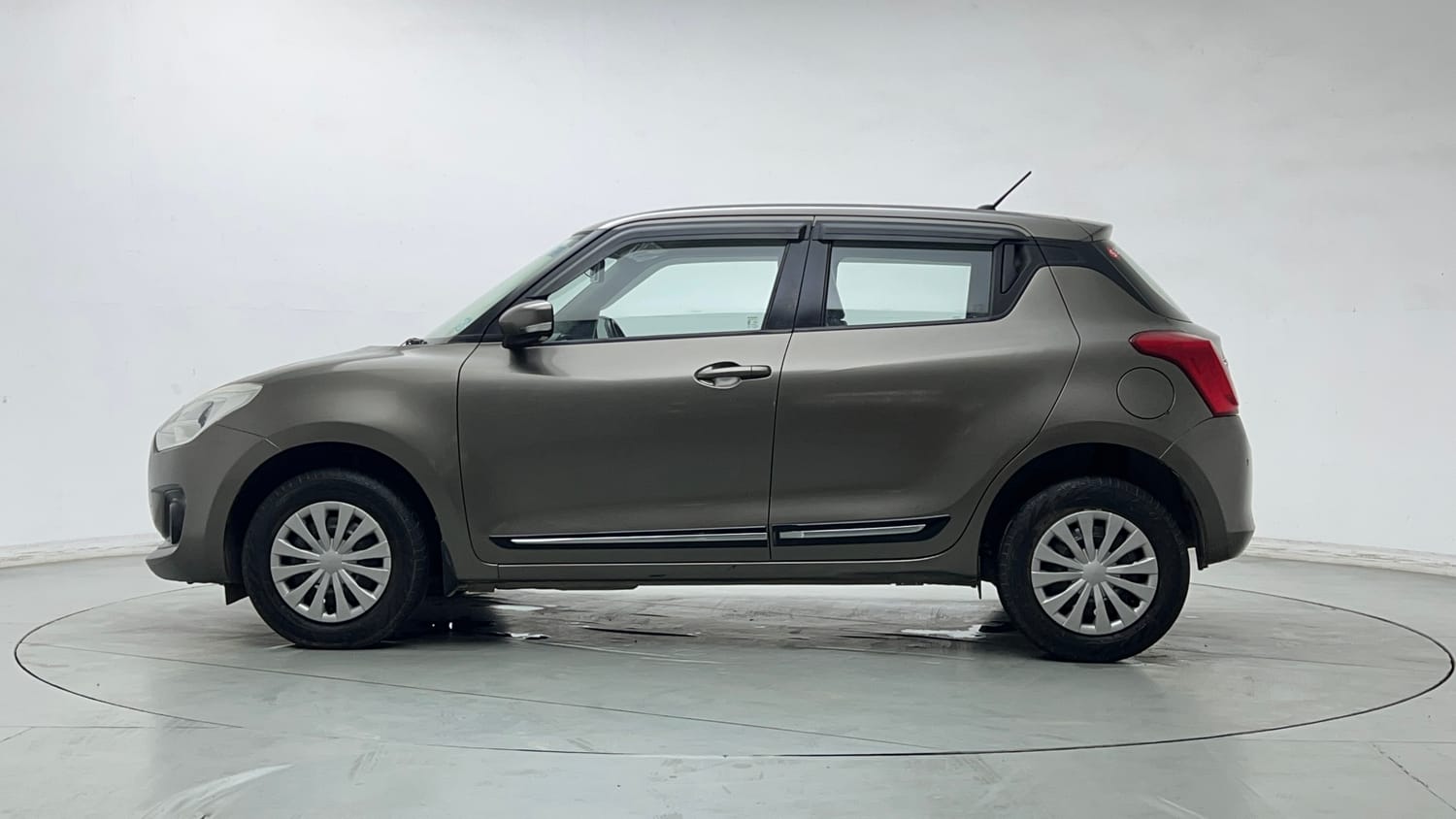 Used 2021 Maruti Suzuki Swift VXi Petrol Manual exterior LEFT SIDE VIEW