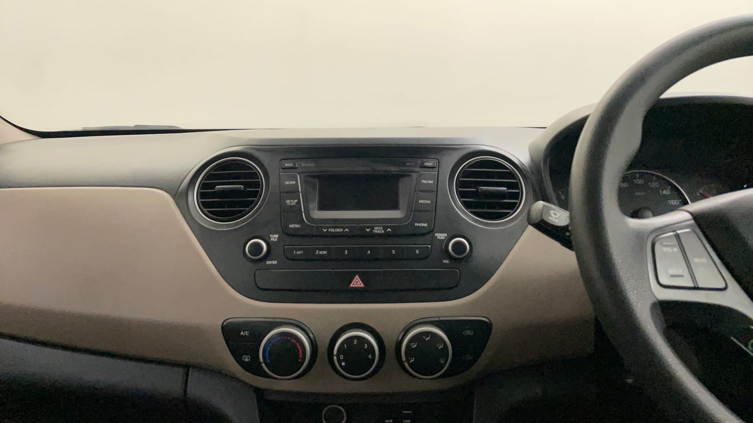 Used 2016 Hyundai Grand i10 Sportz 1.2 Kappa VTVT Petrol Manual interior MUSIC SYSTEM & AC CONTROL VIEW
