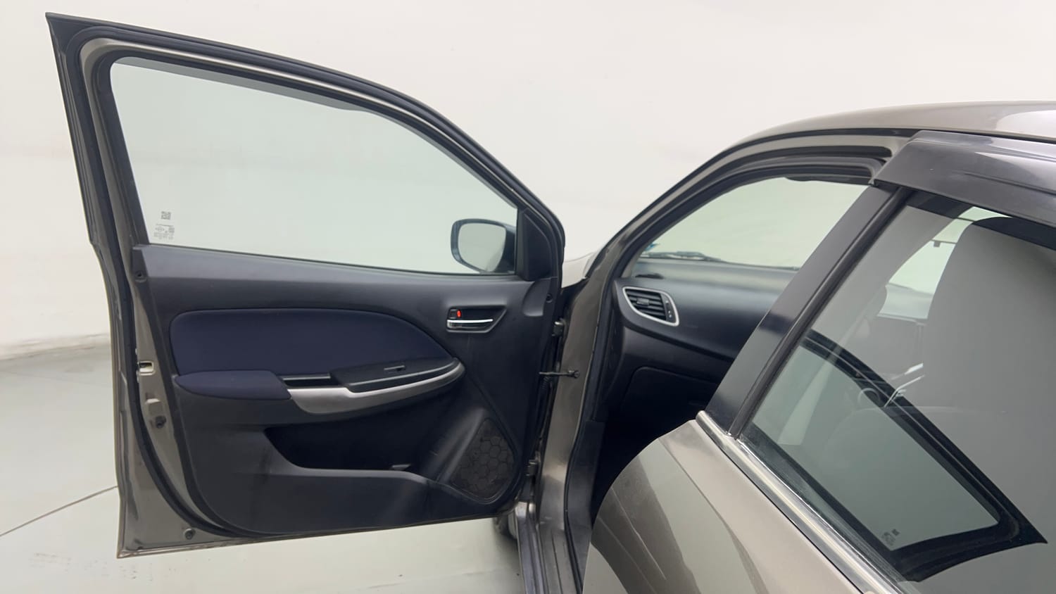 Used 2020 Maruti Suzuki Baleno Delta Petrol Manual interior LEFT FRONT DOOR OPEN VIEW