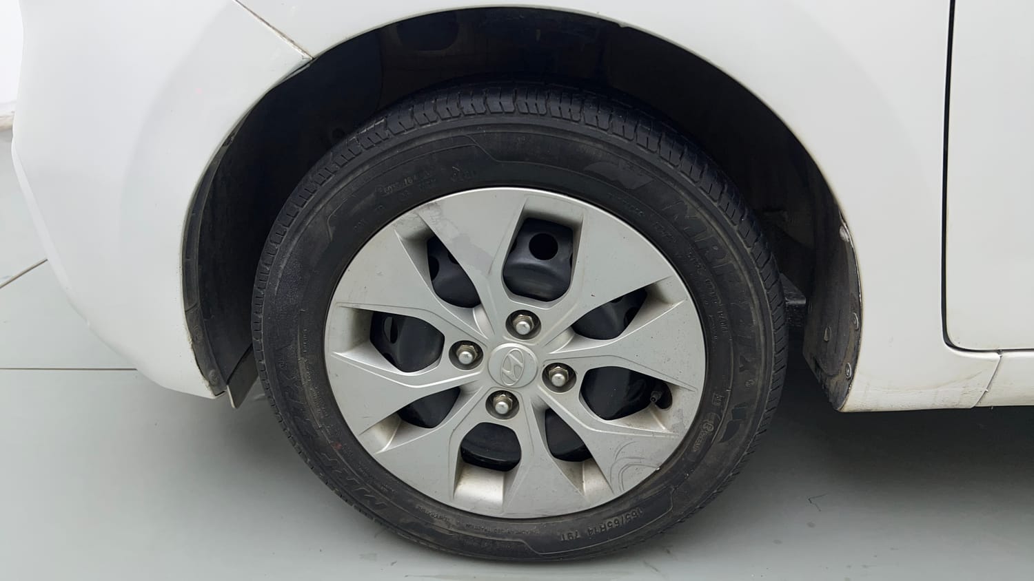 Used 2019 Hyundai Xcent S Petrol+cng(outside fitted) Cng Manual tyres LEFT FRONT TYRE RIM VIEW