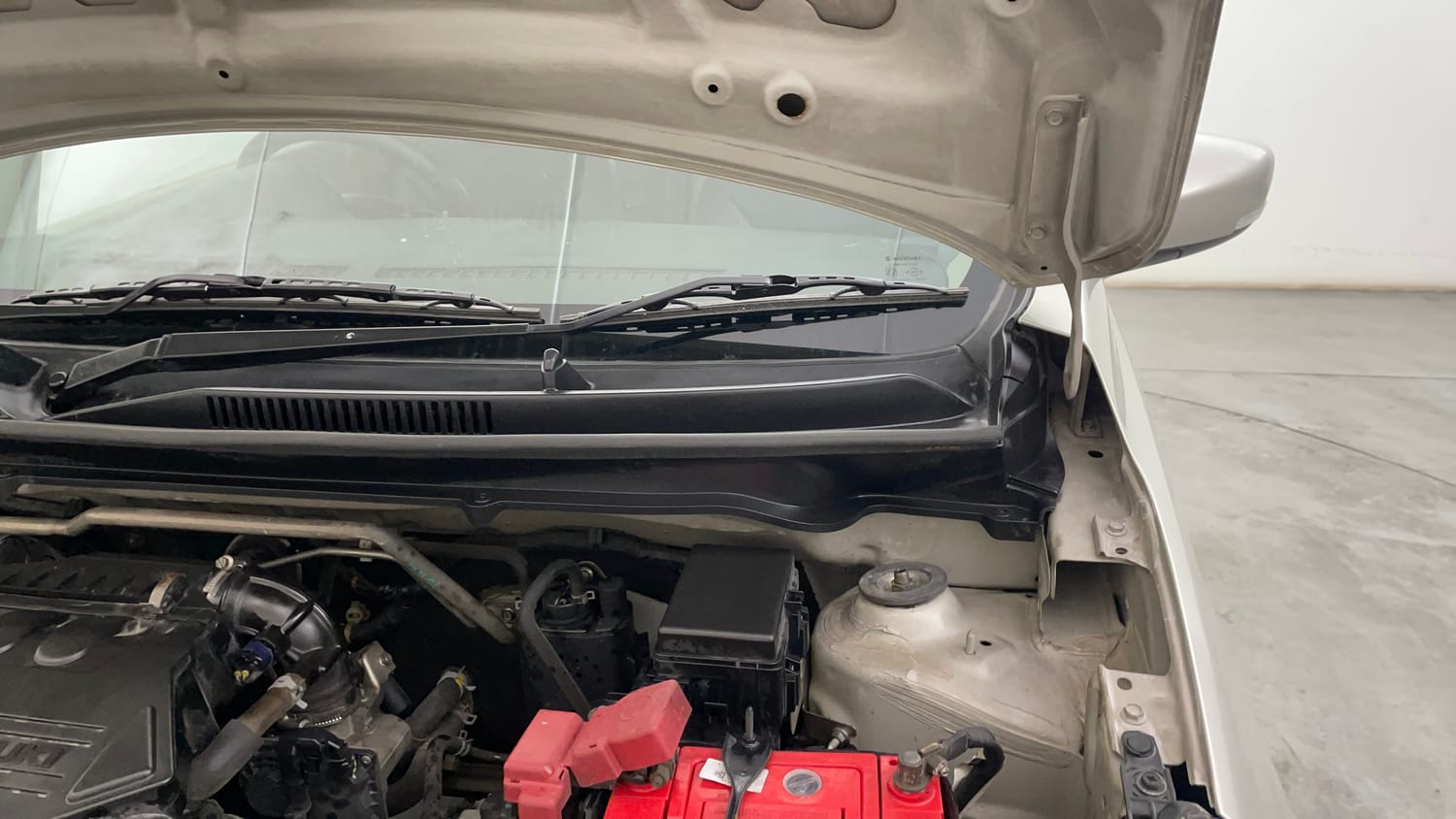 Used 2019 Maruti Suzuki Celerio ZXi (O) AMT Petrol Automatic engine ENGINE LEFT SIDE HINGE & APRON VIEW