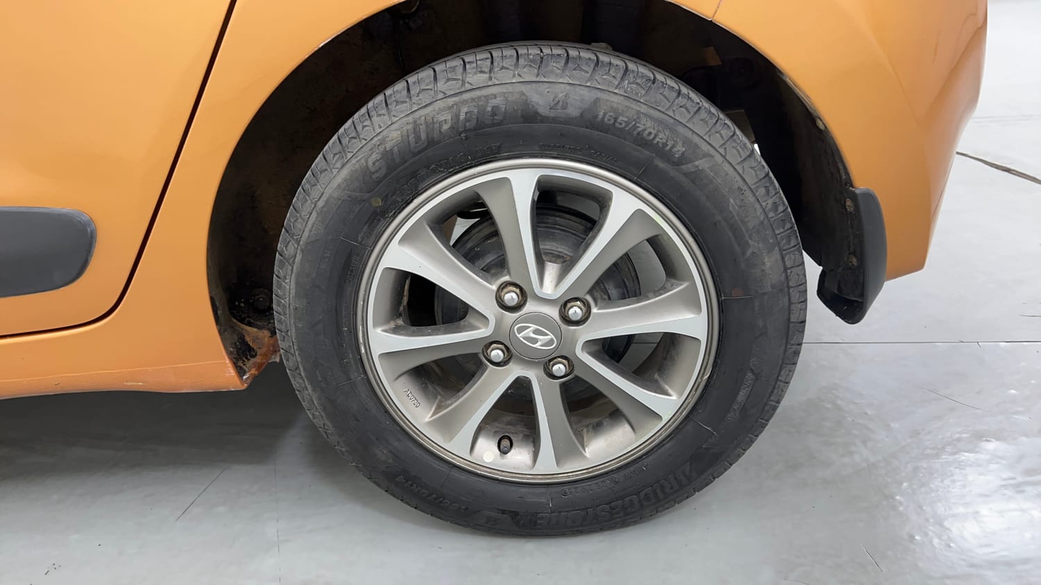 Used 2014 Hyundai Grand i10 Asta 1.2 Kappa VTVT (O) Petrol Manual tyres LEFT REAR TYRE RIM VIEW
