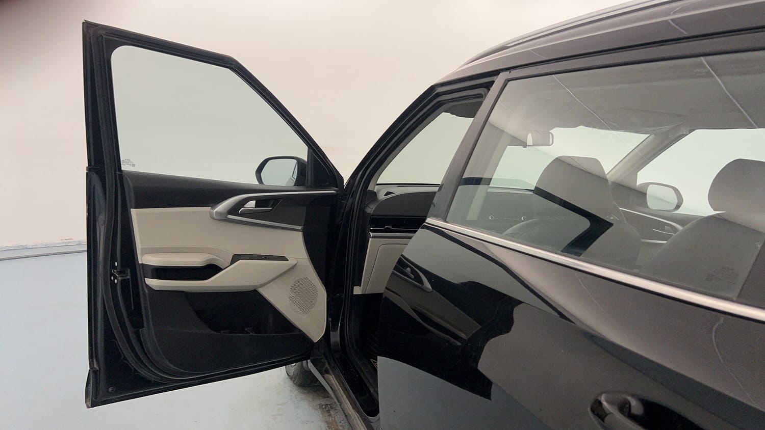 Used 2022 Kia Carens Prestige Plus 1.4 Petrol MT 7 STR Petrol Manual interior LEFT FRONT DOOR OPEN VIEW