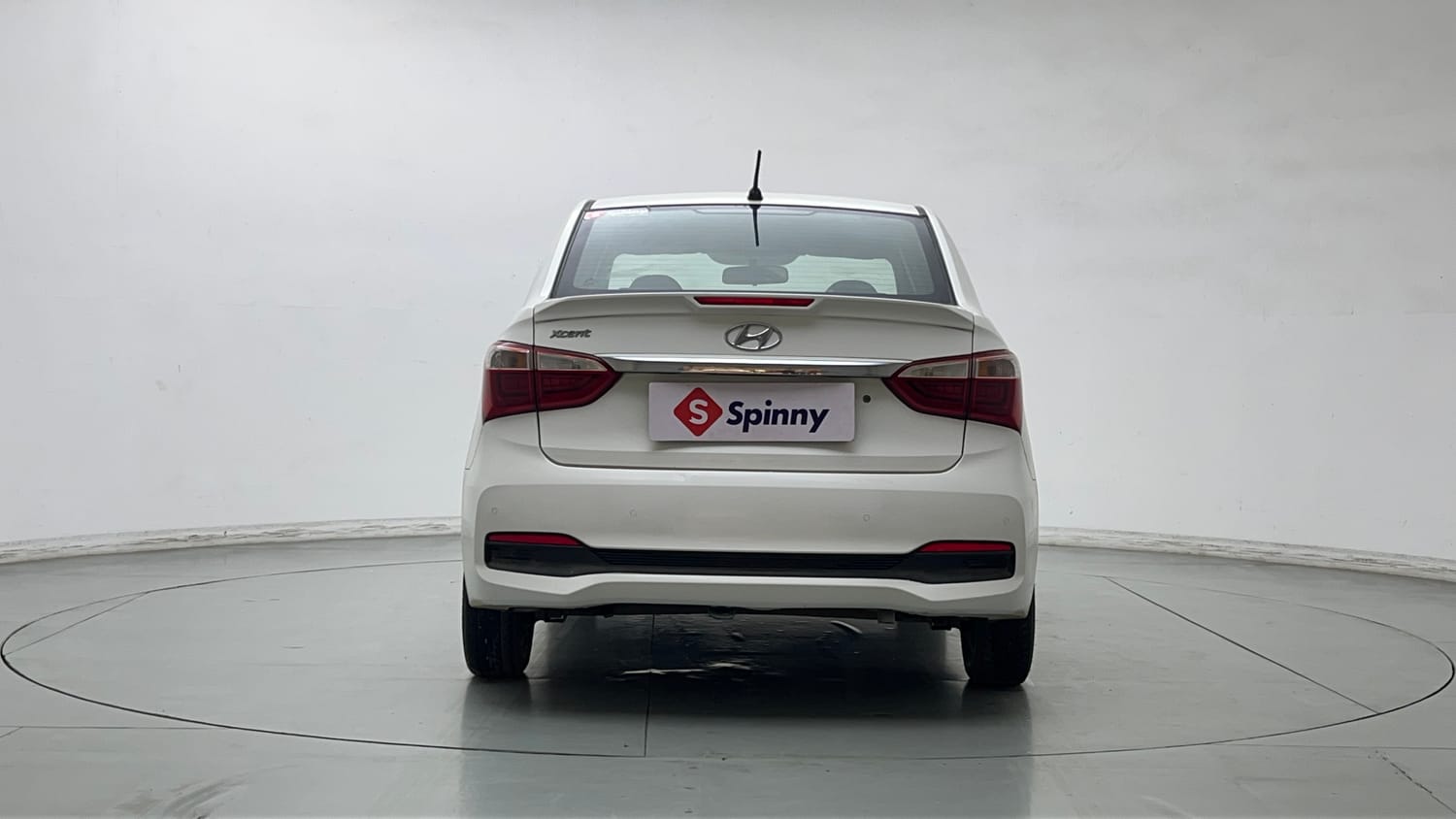 Used 2019 Hyundai Xcent S Petrol+cng(outside fitted) Cng Manual exterior BACK VIEW