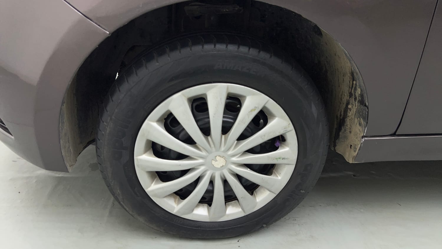 Used 2017 Tata Tiago Revotron XT Petrol Manual tyres LEFT FRONT TYRE RIM VIEW