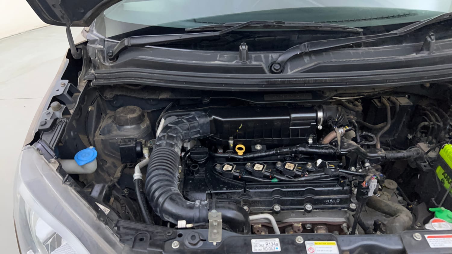 Used 2019 Maruti Suzuki Wagon R ZXi 1.2 Petrol Manual engine ENGINE RIGHT SIDE HINGE & APRON VIEW