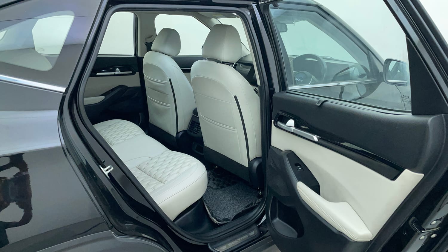 Used 2022 Kia Seltos HTX 1.5 Petrol Manual interior RIGHT SIDE REAR DOOR CABIN VIEW