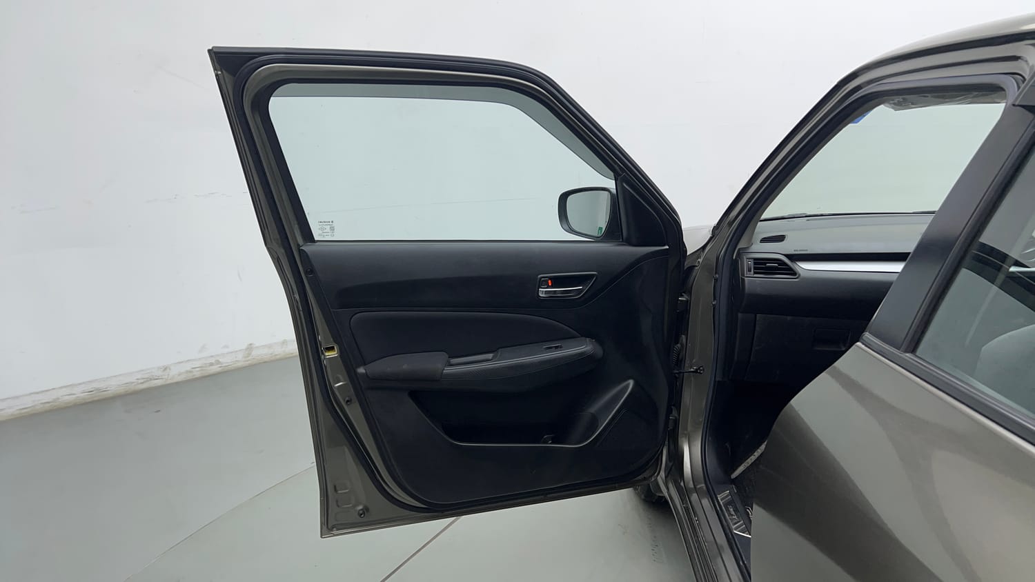 Used 2021 Maruti Suzuki Swift VXi Petrol Manual interior LEFT FRONT DOOR OPEN VIEW