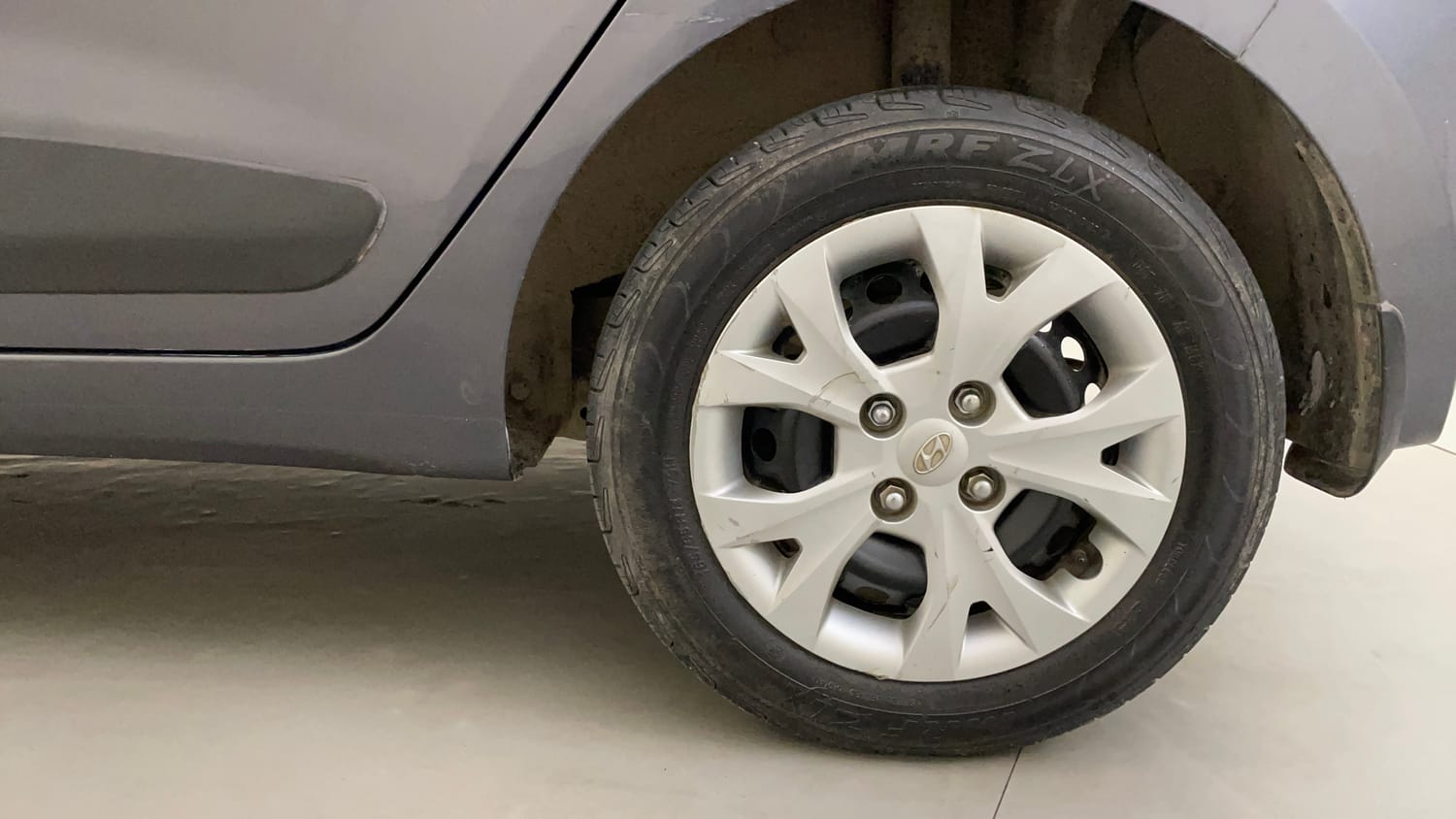 Used 2016 Hyundai Grand i10 Sportz 1.2 Kappa VTVT Petrol Manual tyres LEFT REAR TYRE RIM VIEW