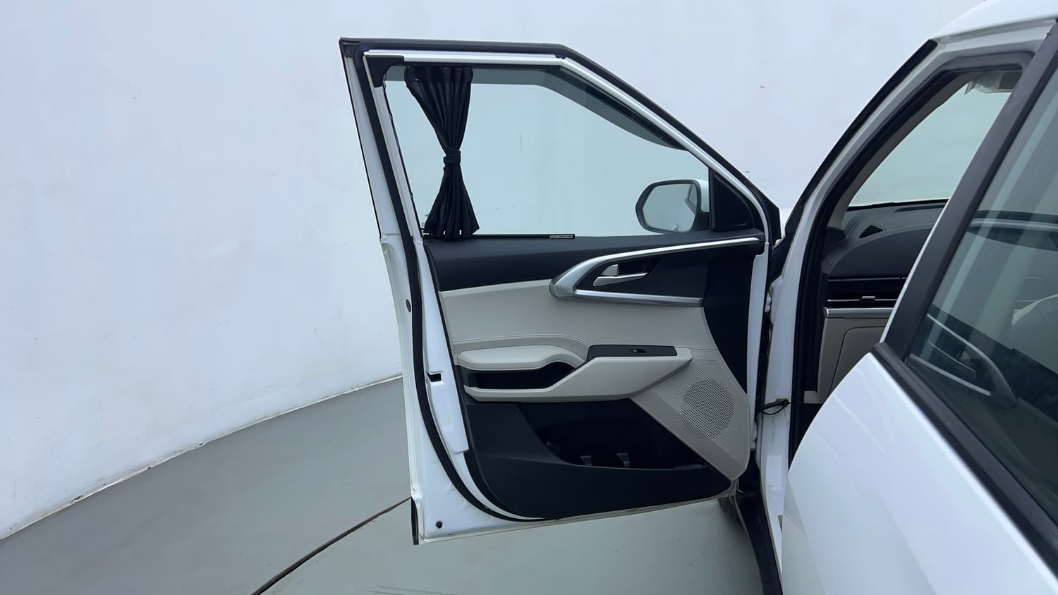 Used 2022 Kia Carens Prestige 1.4 Petrol MT 7 STR Petrol Manual interior LEFT FRONT DOOR OPEN VIEW