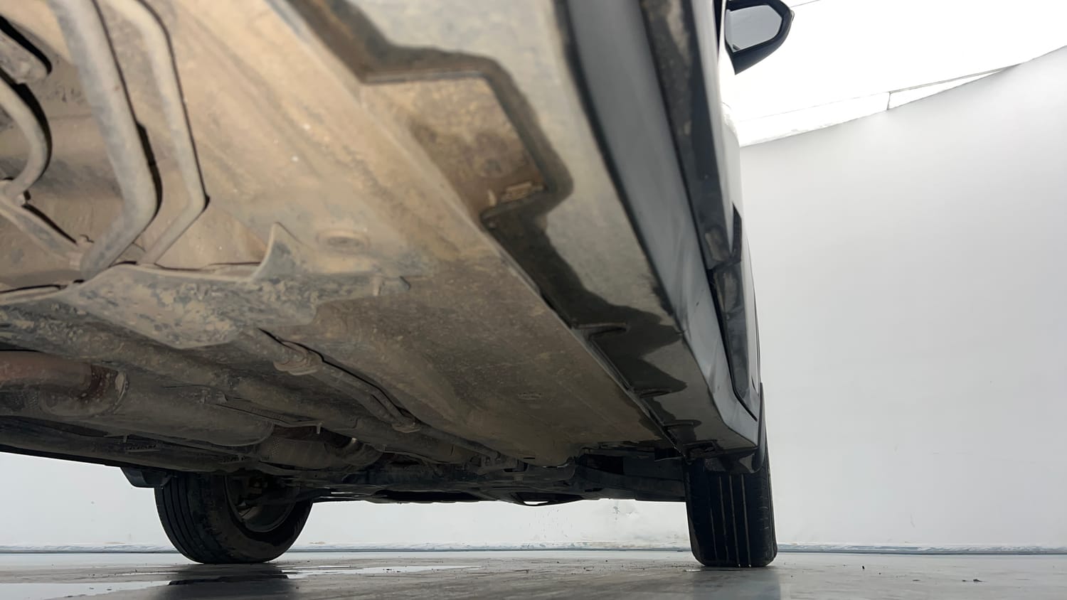 Used 2022 Kia Carens Prestige Plus 1.4 Petrol MT 7 STR Petrol Manual extra REAR RIGHT UNDERBODY VIEW