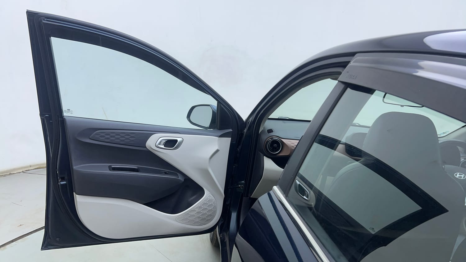 Used 2023 Hyundai Aura SX 1.2 CNG Cng Manual interior LEFT FRONT DOOR OPEN VIEW