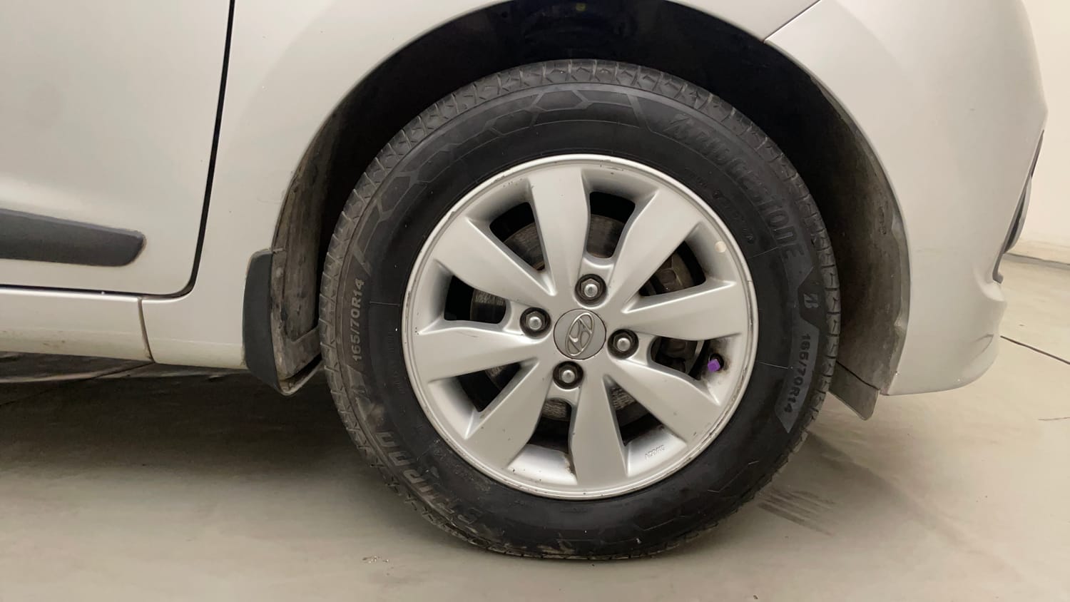 Used 2014 Hyundai Xcent S 1.2 (O) Petrol Manual tyres RIGHT FRONT TYRE RIM VIEW