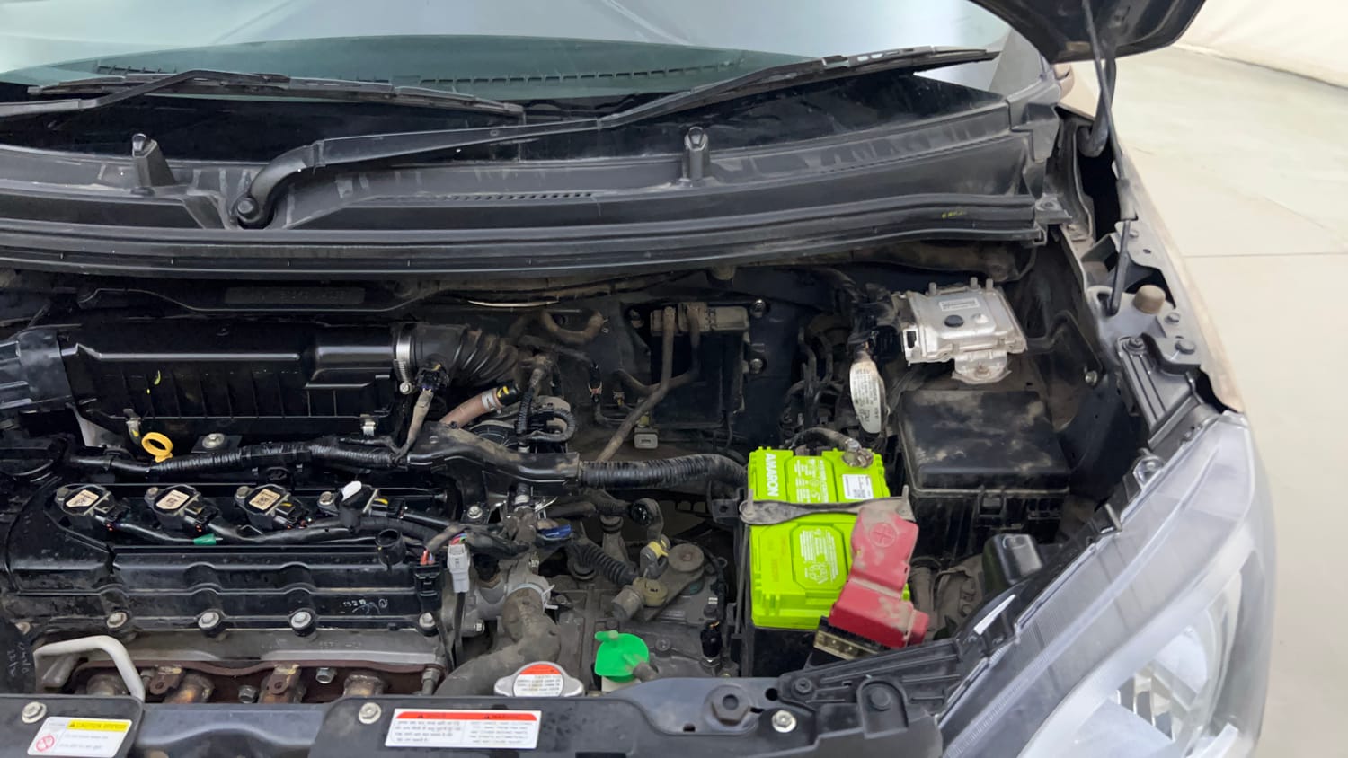 Used 2019 Maruti Suzuki Wagon R ZXi 1.2 Petrol Manual engine ENGINE LEFT SIDE HINGE & APRON VIEW