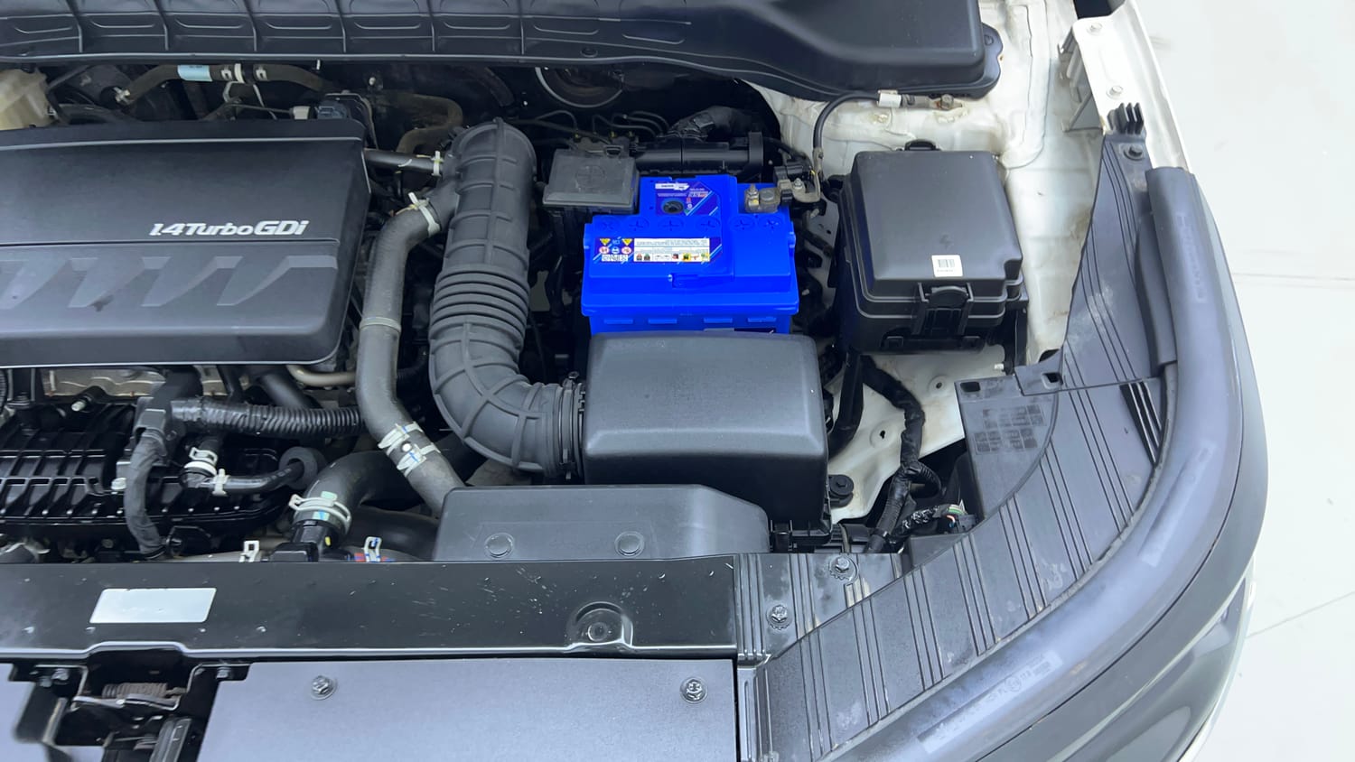 Used 2022 Kia Carens Prestige 1.4 Petrol MT 7 STR Petrol Manual engine ENGINE LEFT SIDE VIEW