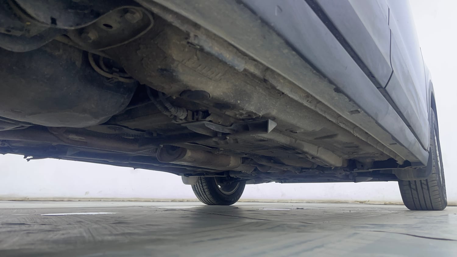 Used 2023 Volkswagen Taigun Highline 1.0 TSI MT Petrol Manual extra REAR RIGHT UNDERBODY VIEW