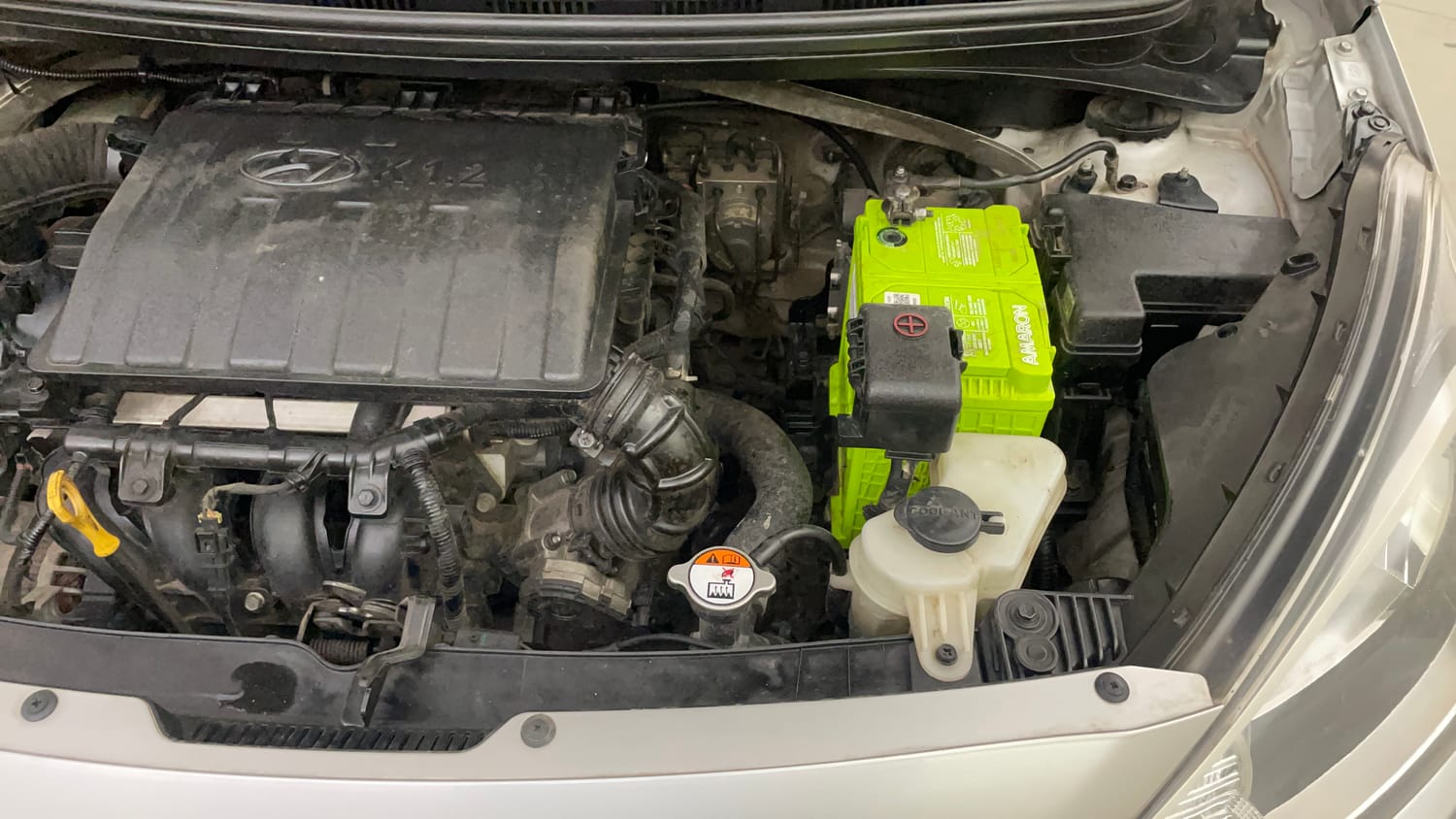 Used 2014 Hyundai Xcent S 1.2 (O) Petrol Manual engine ENGINE LEFT SIDE VIEW
