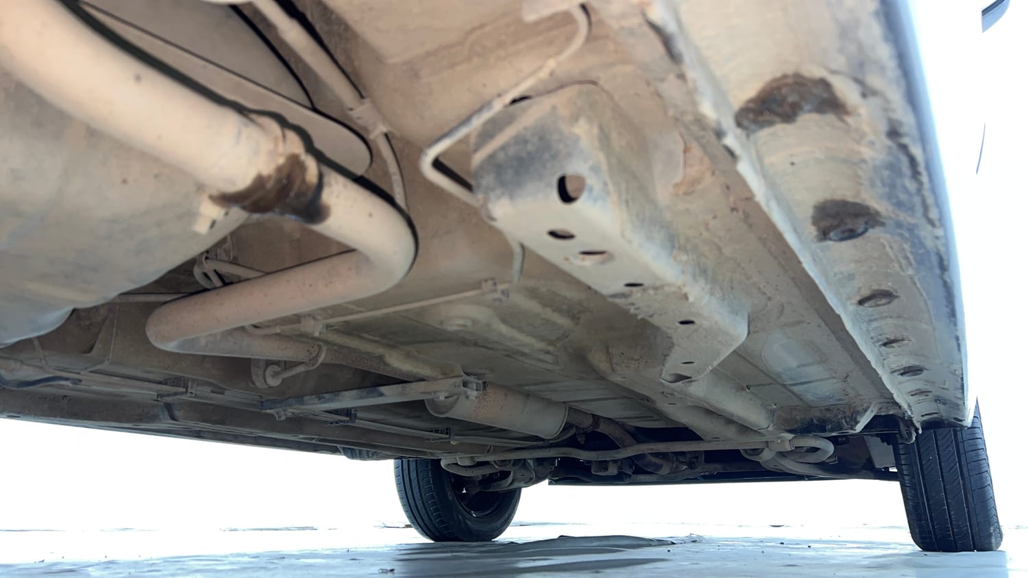 Used 2017 Tata Tiago Revotron XT Petrol Manual extra REAR RIGHT UNDERBODY VIEW