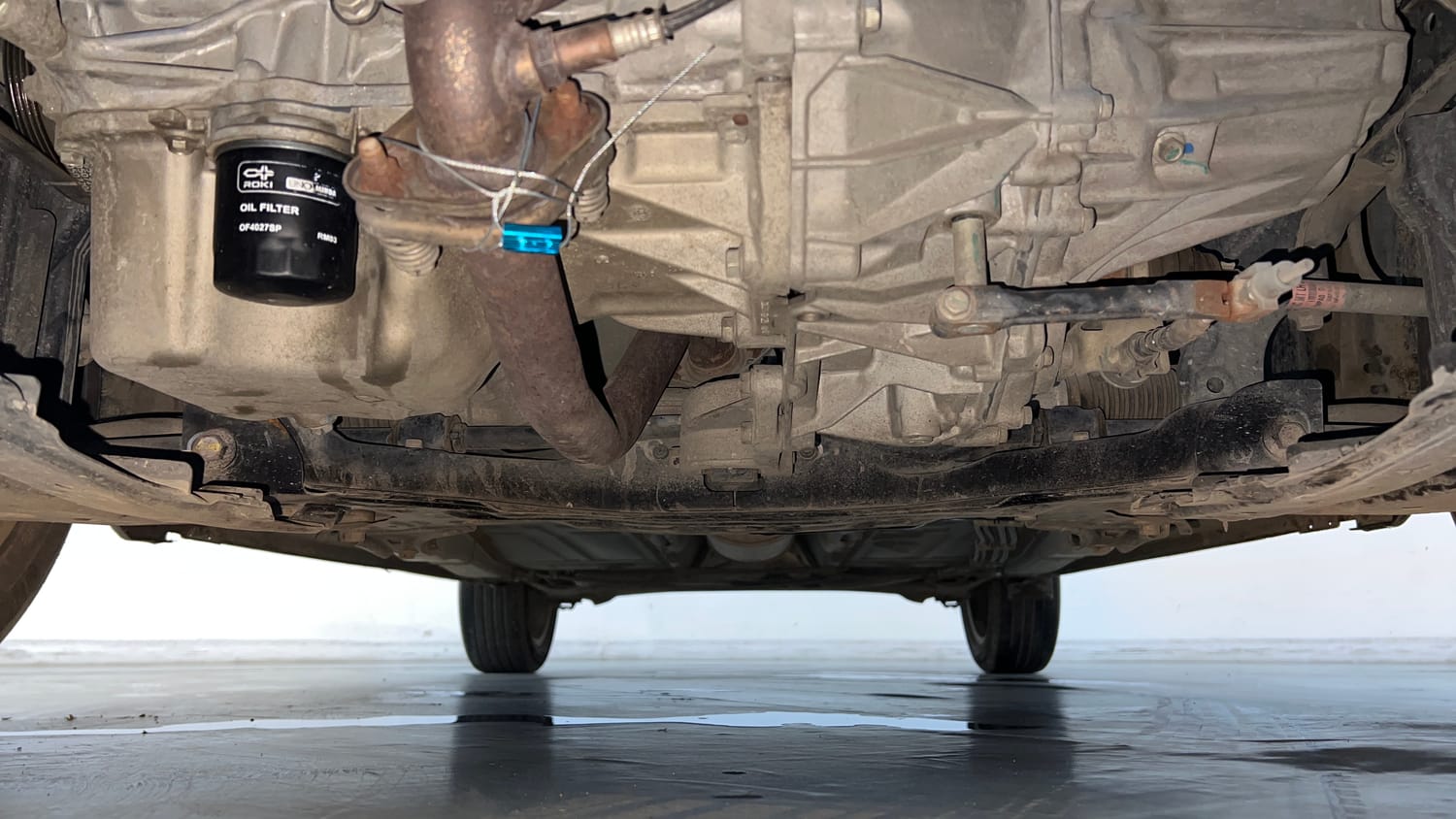 Used 2021 Maruti Suzuki Baleno Zeta Petrol Manual extra FRONT LEFT UNDERBODY VIEW