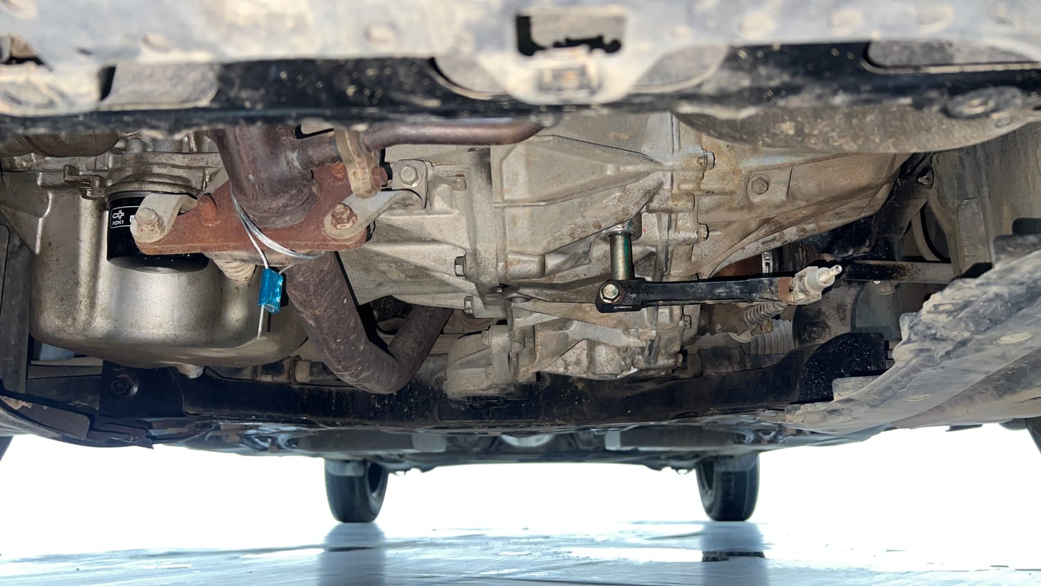 Used 2021 Maruti Suzuki Swift VXi Petrol Manual extra FRONT LEFT UNDERBODY VIEW