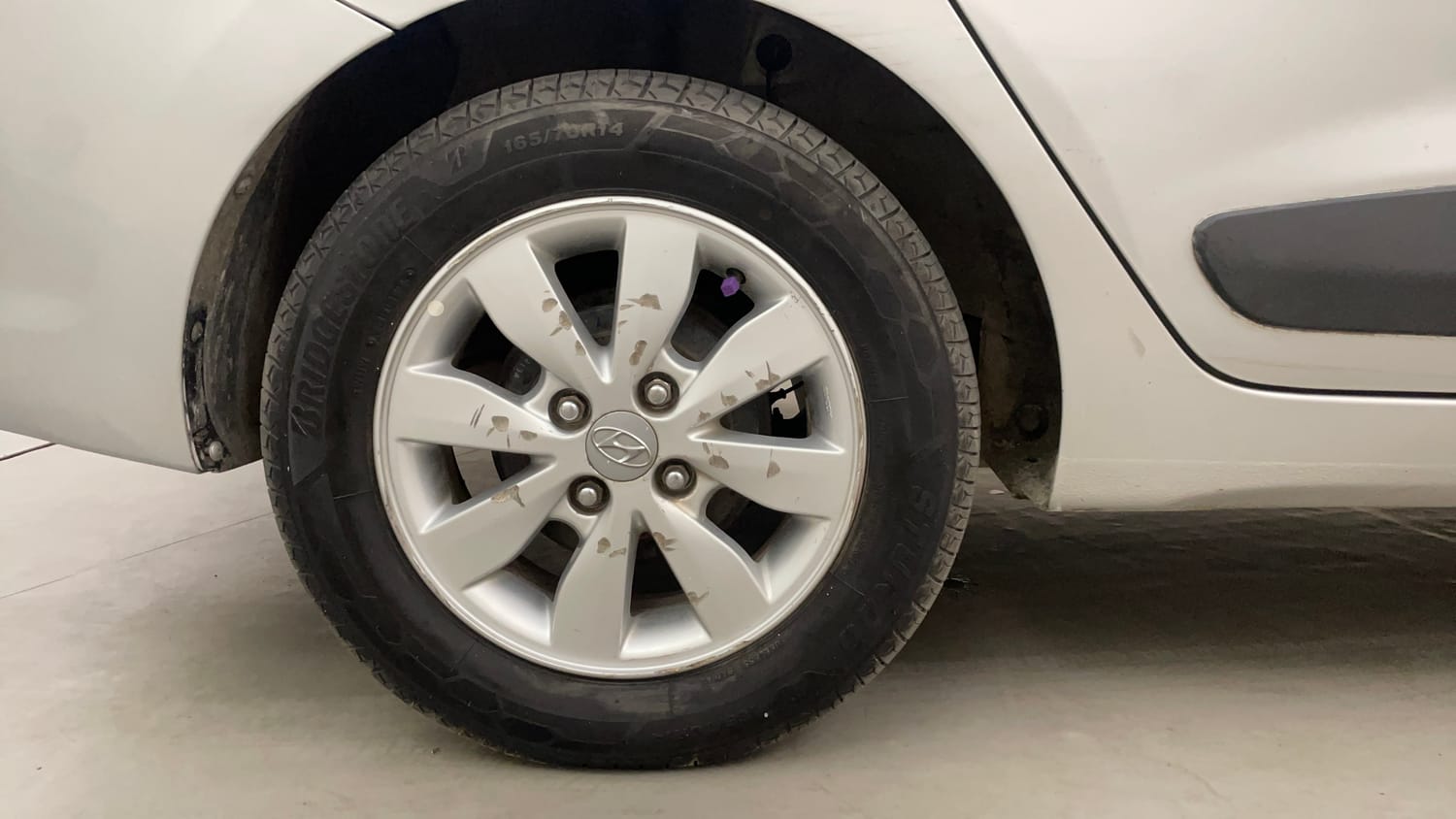 Used 2014 Hyundai Xcent S 1.2 (O) Petrol Manual tyres RIGHT REAR TYRE RIM VIEW