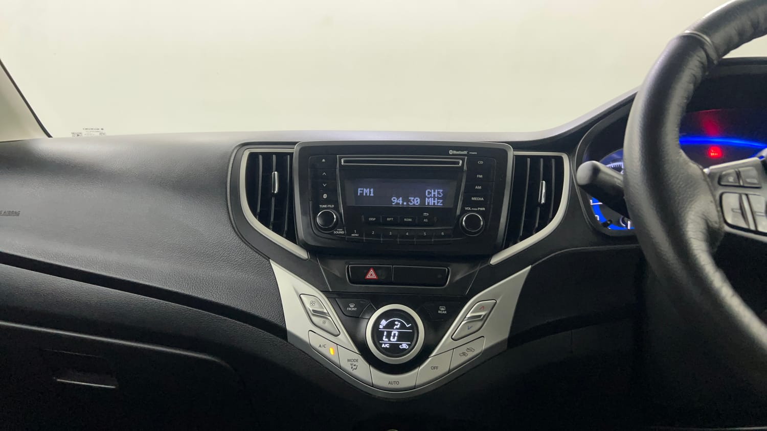 Used 2018 Maruti Suzuki Baleno Delta 1.2 Petrol Manual interior MUSIC SYSTEM & AC CONTROL VIEW