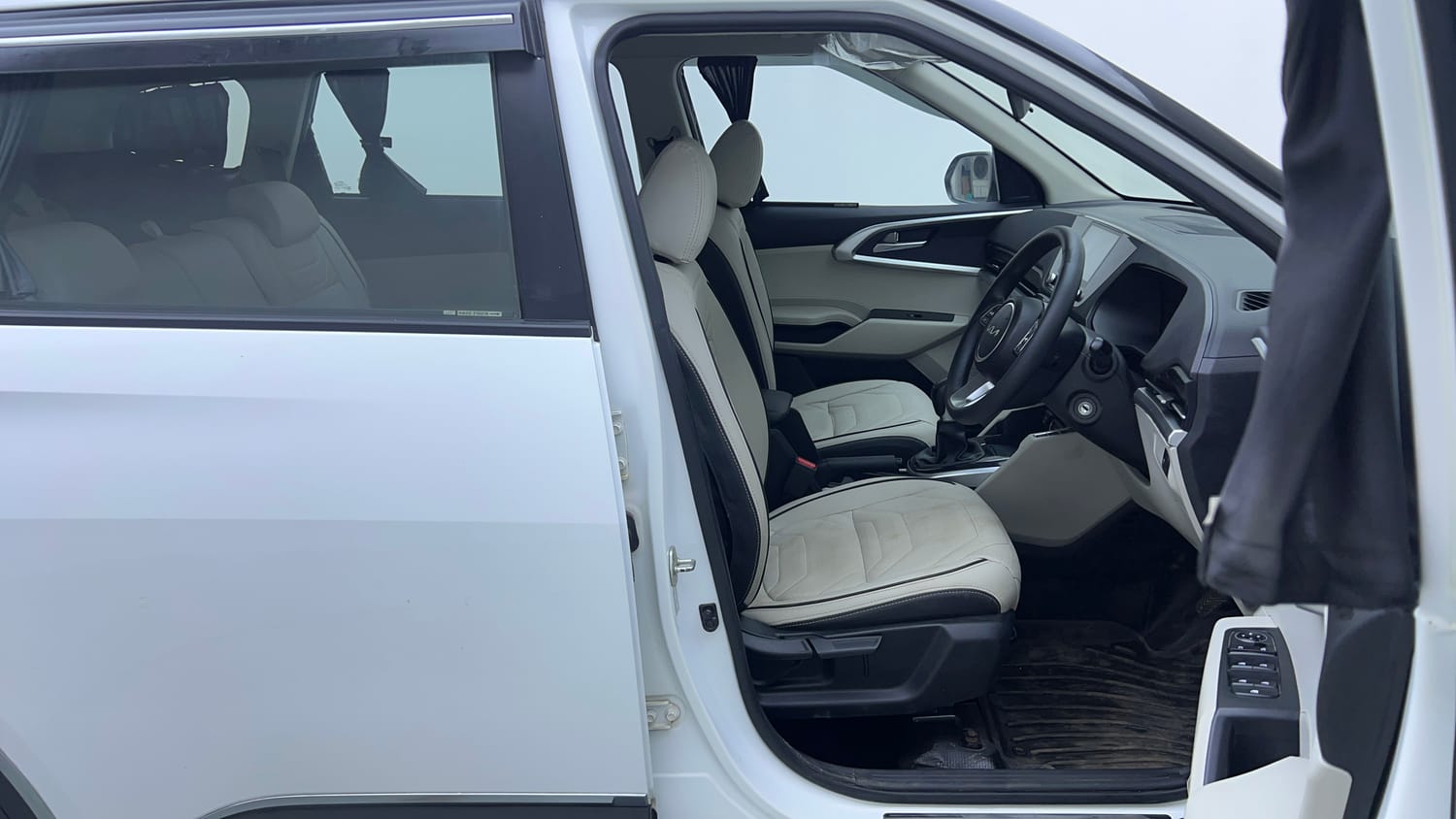Used 2022 Kia Carens Prestige 1.4 Petrol MT 7 STR Petrol Manual interior RIGHT SIDE FRONT DOOR CABIN VIEW