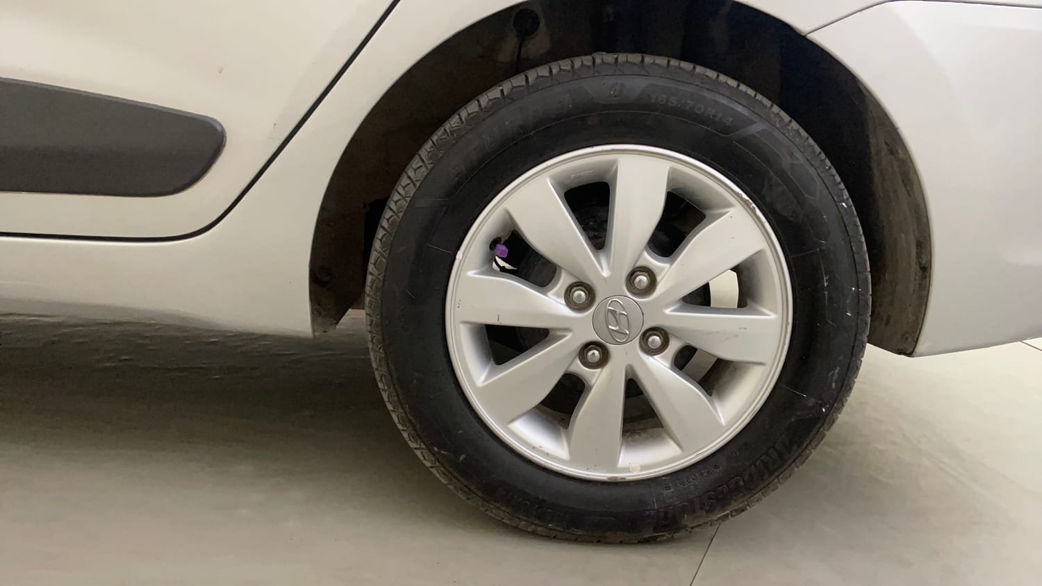 Used 2014 Hyundai Xcent S 1.2 (O) Petrol Manual tyres LEFT REAR TYRE RIM VIEW