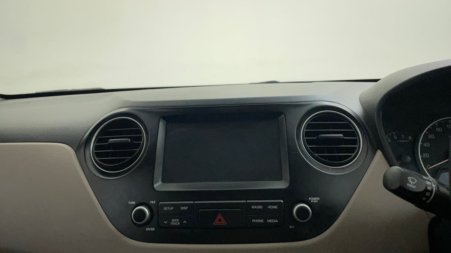 Used 2020 Hyundai Grand i10 Sportz 1.2 Kappa VTVT Petrol Manual top_features Integrated (in-dash) music system