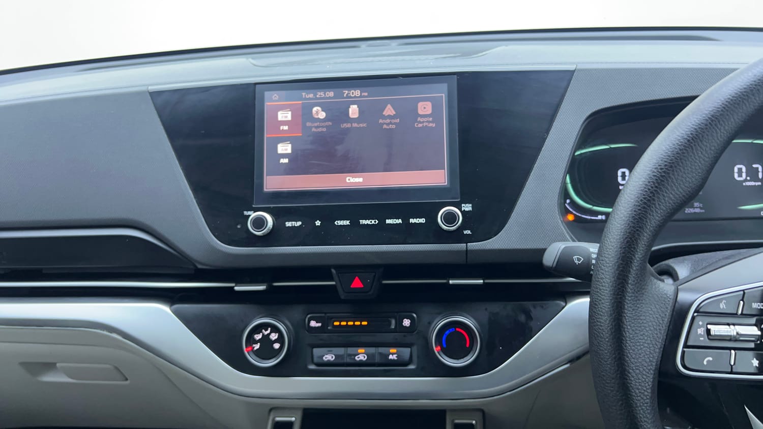 Used 2022 Kia Carens Prestige 1.4 Petrol MT 7 STR Petrol Manual interior MUSIC SYSTEM & AC CONTROL VIEW