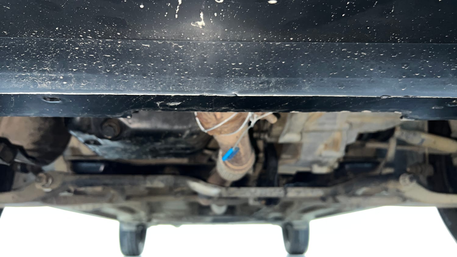 Used 2017 Tata Tiago Revotron XT Petrol Manual extra FRONT LEFT UNDERBODY VIEW