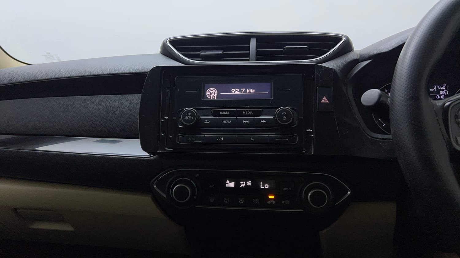 Used 2018 Honda Amaze 1.2 V CVT Petrol Petrol Automatic top_features Integrated (in-dash) music system