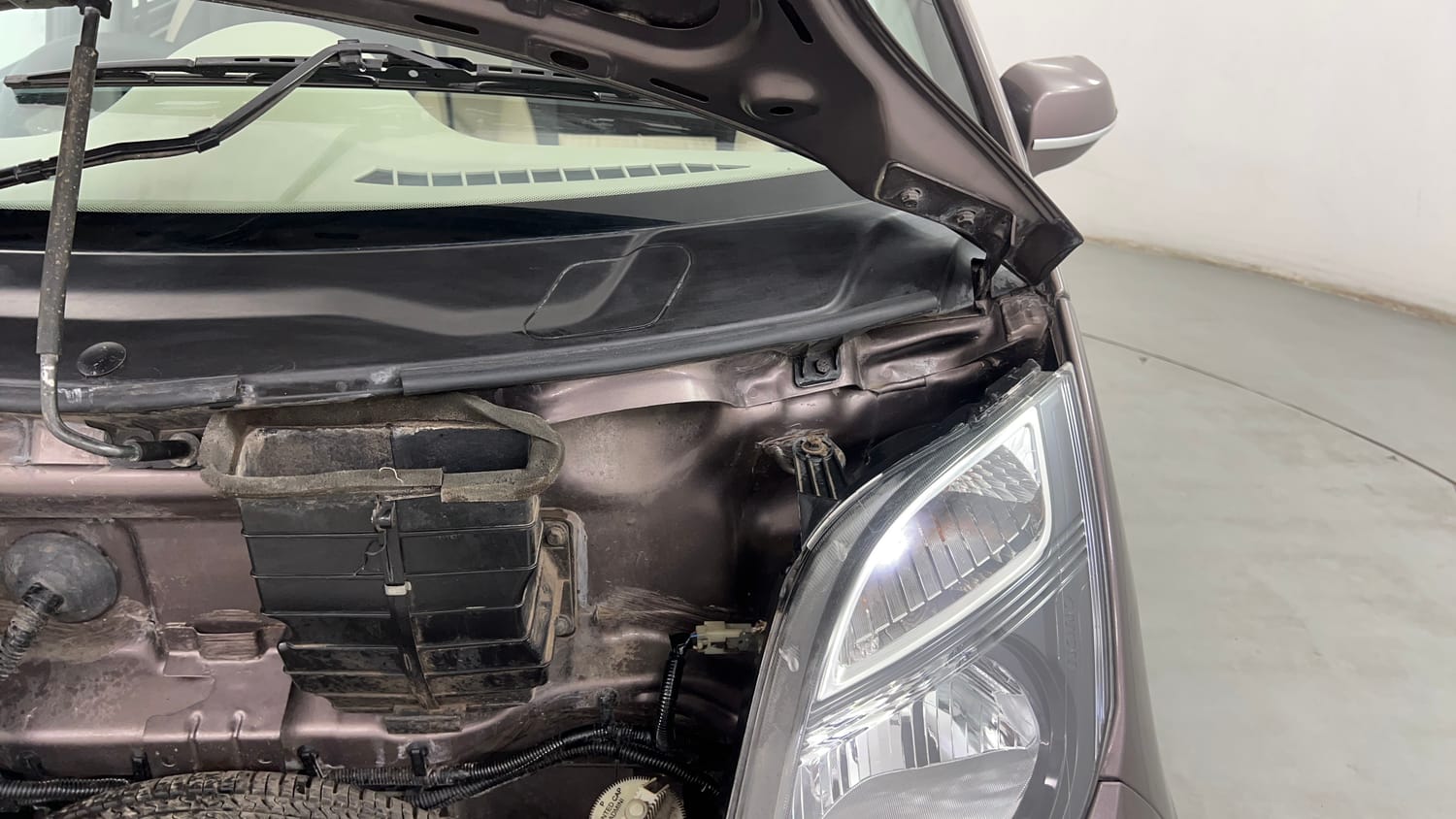 Used 2018 Tata Nano Twist XTA Petrol Automatic engine ENGINE LEFT SIDE HINGE & APRON VIEW