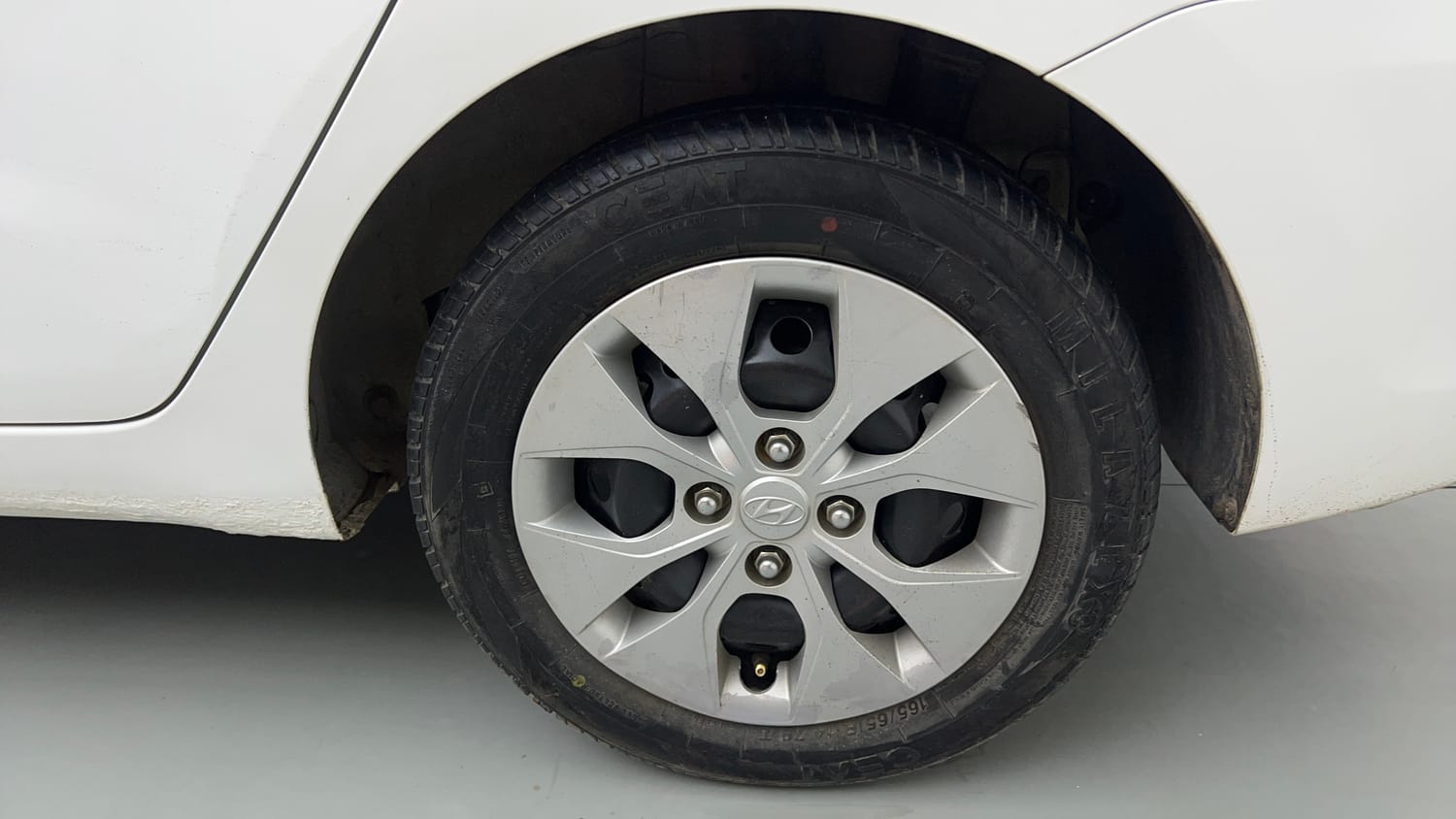 Used 2019 Hyundai Xcent S Petrol+cng(outside fitted) Cng Manual tyres LEFT REAR TYRE RIM VIEW