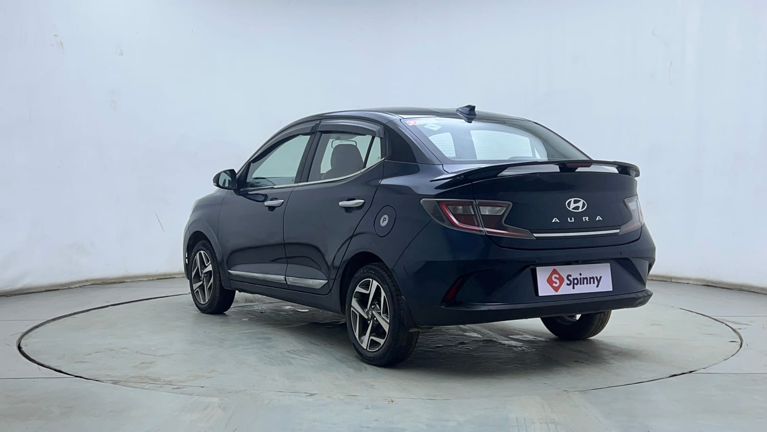 Used 2023 Hyundai Aura SX 1.2 CNG Cng Manual exterior LEFT REAR CORNER VIEW