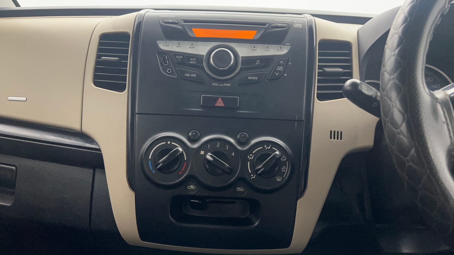 Used 2017 Maruti Suzuki Wagon R VXI Petrol Manual top_features Integrated (in-dash) music system