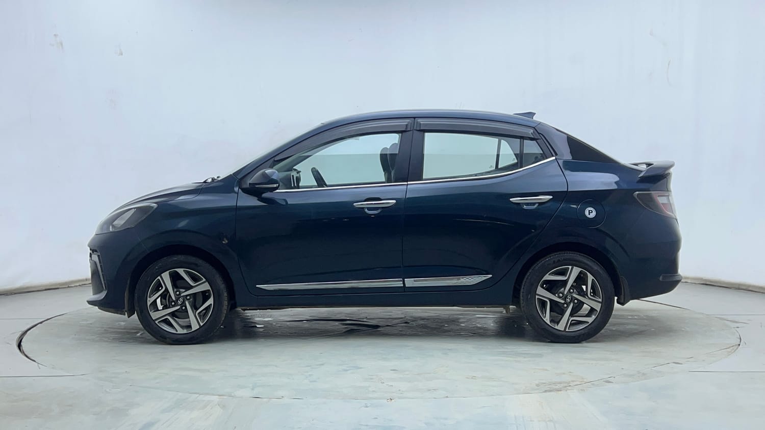 Used 2023 Hyundai Aura SX 1.2 CNG Cng Manual exterior LEFT SIDE VIEW