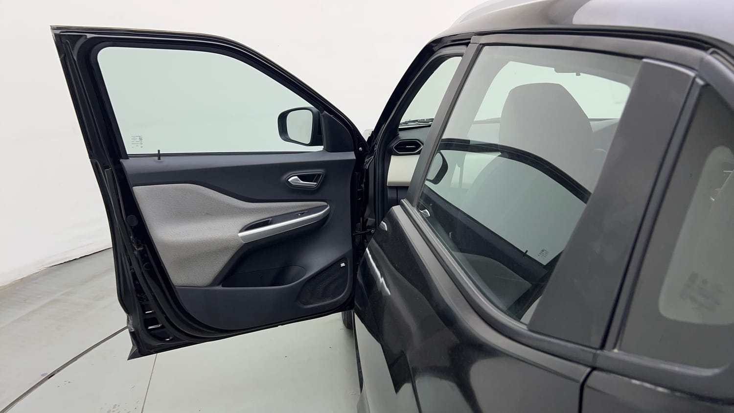 Used 2023 Nissan Magnite Geza Edition Petrol Manual interior LEFT FRONT DOOR OPEN VIEW