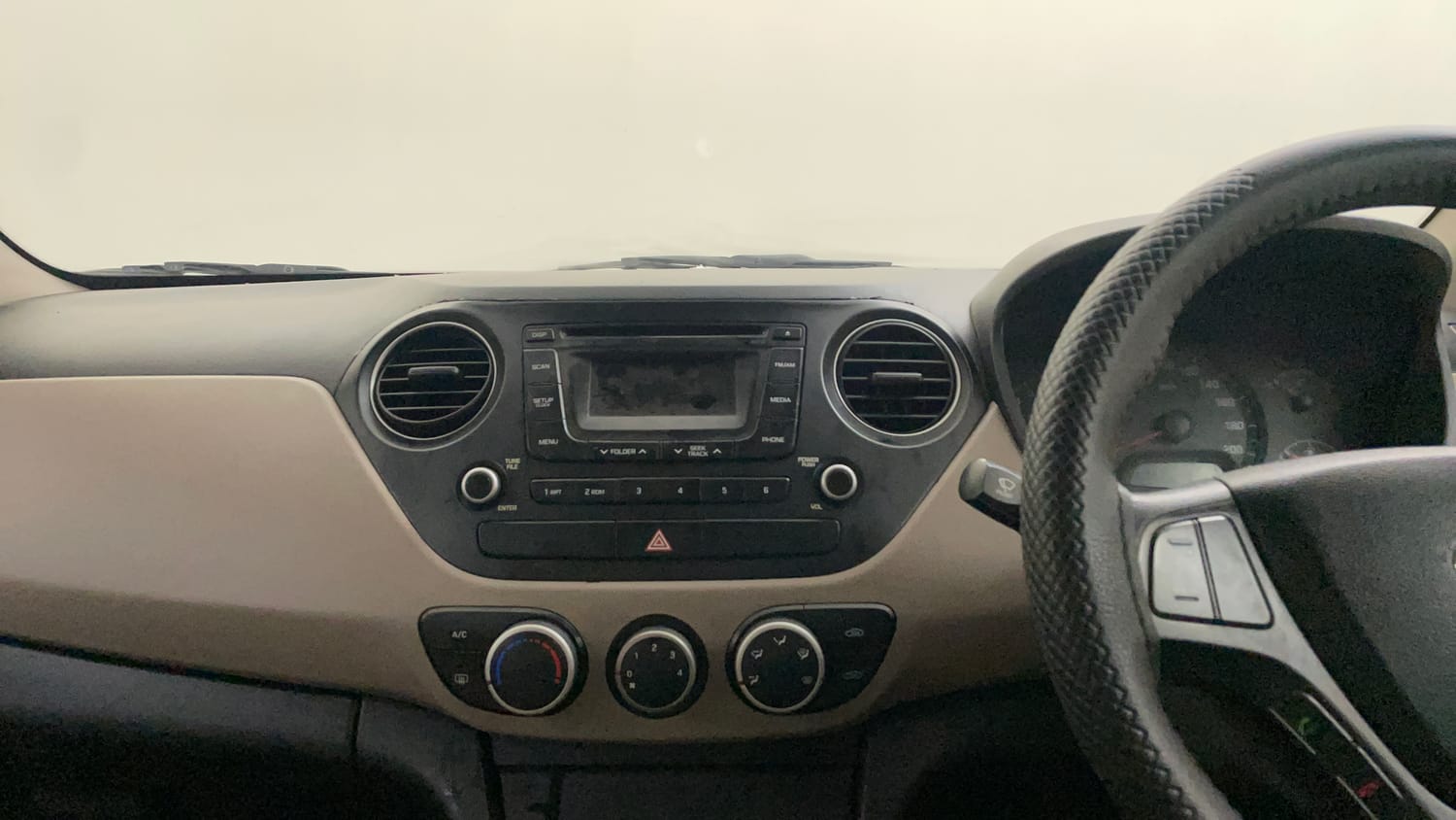 Used 2014 Hyundai Xcent S 1.2 (O) Petrol Manual interior MUSIC SYSTEM & AC CONTROL VIEW