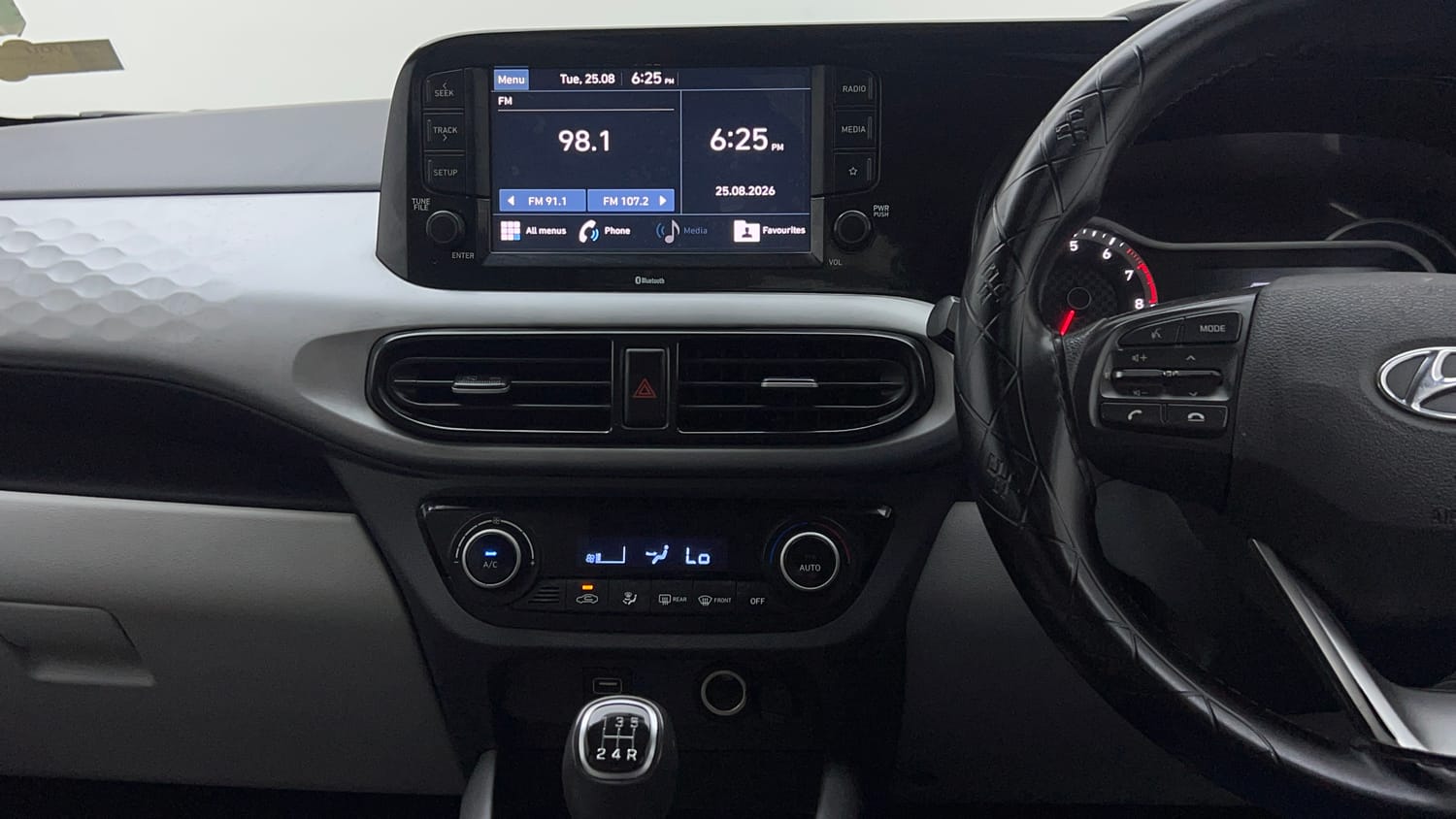 Used 2021 Hyundai Grand i10 Nios Sportz 1.2 Kappa VTVT Petrol Manual interior MUSIC SYSTEM & AC CONTROL VIEW