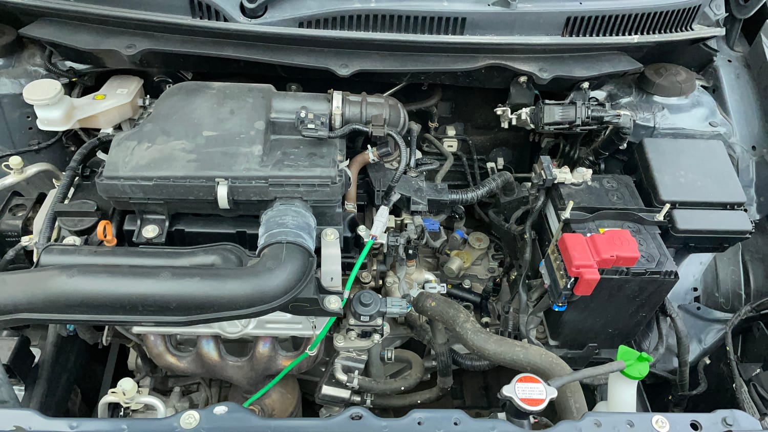 Used 2024 Maruti Suzuki Baleno Alpha MT Petrol Manual engine ENGINE LEFT SIDE VIEW