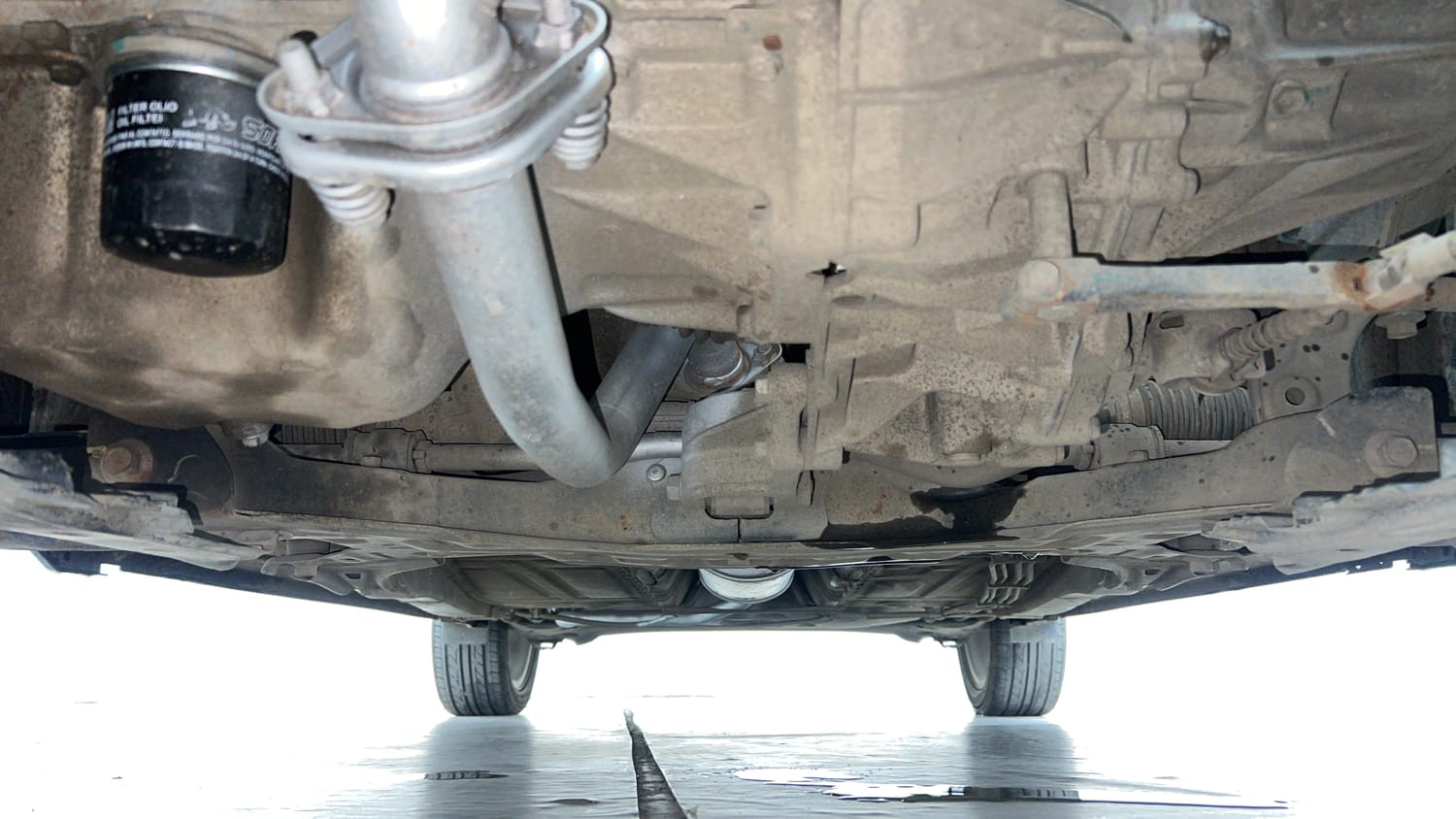 Used 2020 Maruti Suzuki Baleno Zeta Petrol Manual extra FRONT LEFT UNDERBODY VIEW