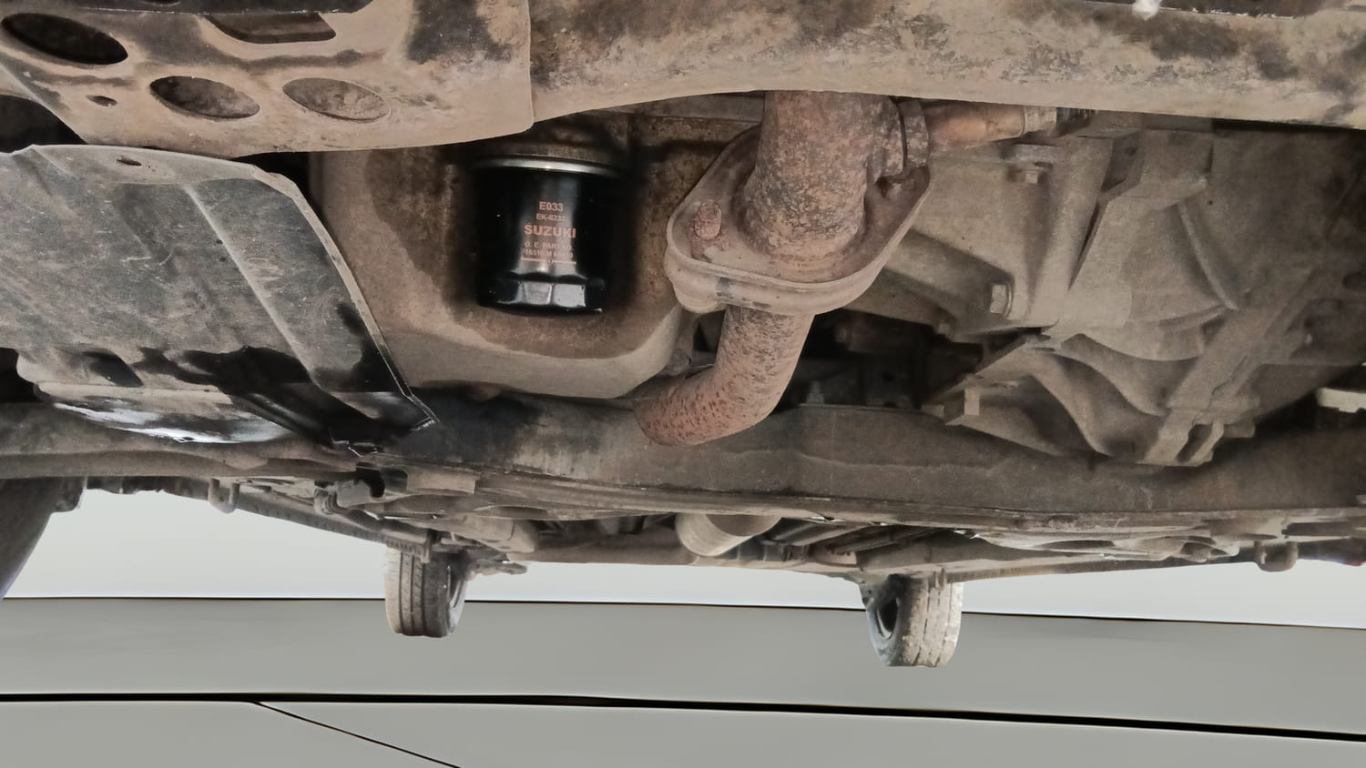 Used 2015 Maruti Suzuki Ertiga Vxi Petrol Manual extra FRONT LEFT UNDERBODY VIEW
