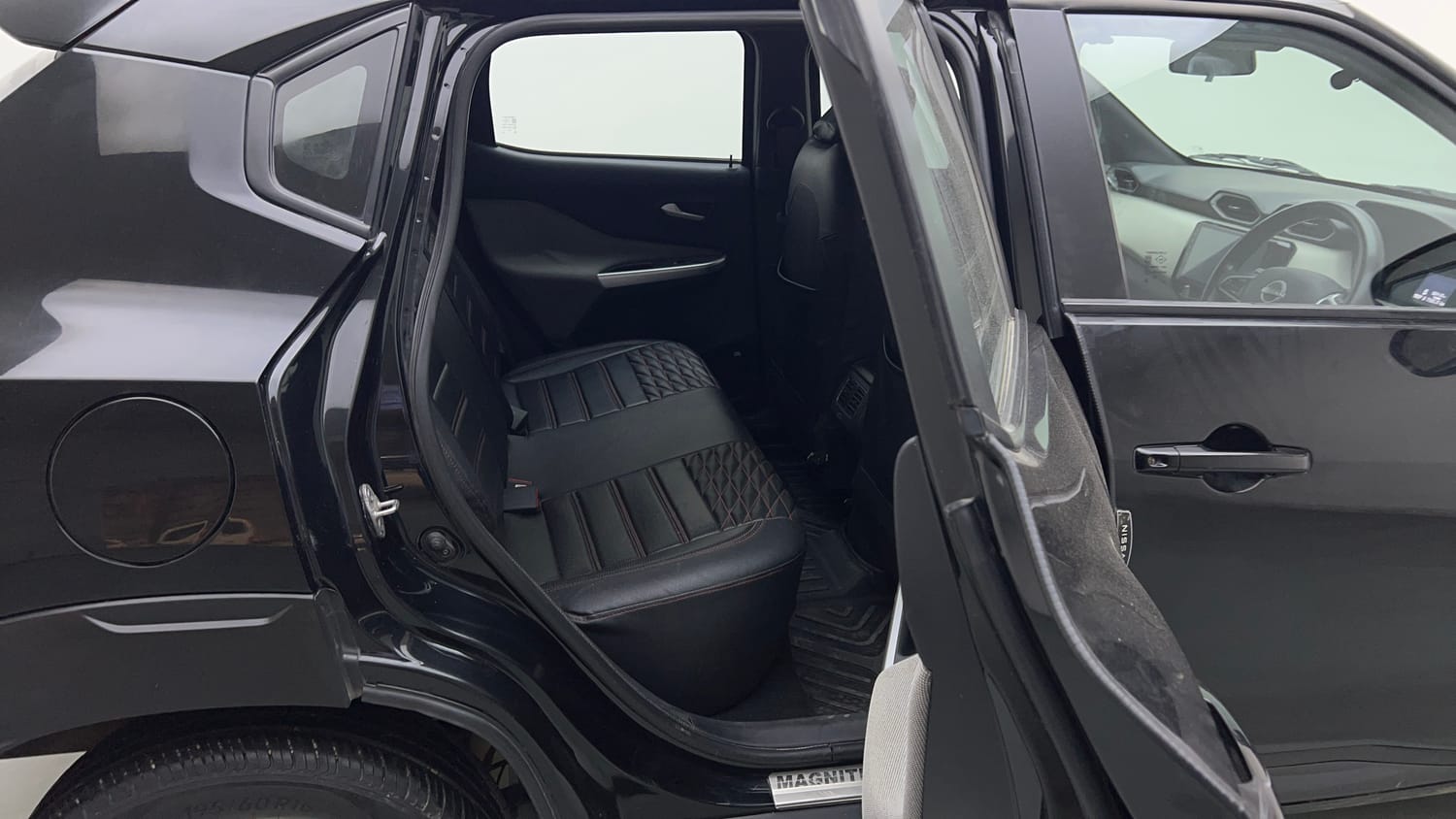 Used 2023 Nissan Magnite Geza Edition Petrol Manual interior RIGHT SIDE REAR DOOR CABIN VIEW