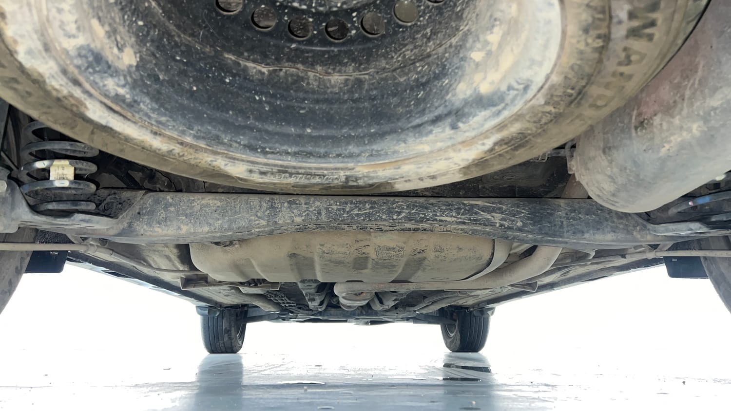 Used 2022 Kia Carens Prestige Plus 1.4 Petrol MT 7 STR Petrol Manual extra REAR UNDERBODY VIEW (TAKEN FROM REAR)