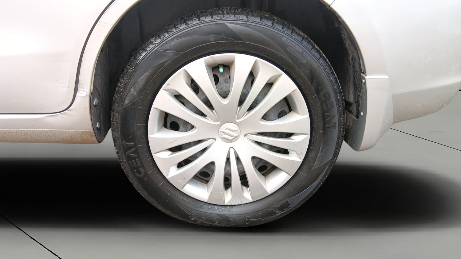 Used 2015 Maruti Suzuki Ertiga Vxi Petrol Manual tyres LEFT REAR TYRE RIM VIEW